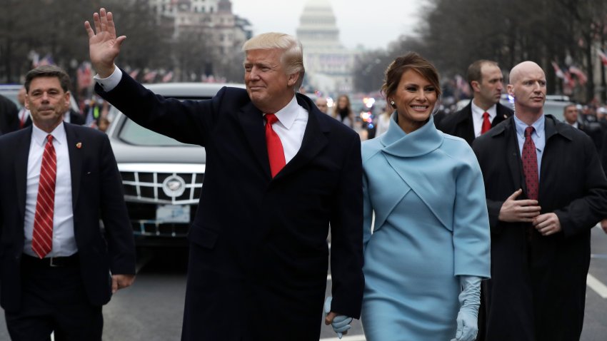 WASHINGTON, DC – JANUARY 20:  U.S. President Donald Trump waves to supporters as he walks the parade route with first lady Melania Trump and son Barron Trump after being sworn in at the 58th Presidential Inauguration January 20, 2017 in Washington, D.C. Donald J. Trump was sworn in today as the 45th president of the United States  (Photo by Evan Vucci – Pool/Getty Images)