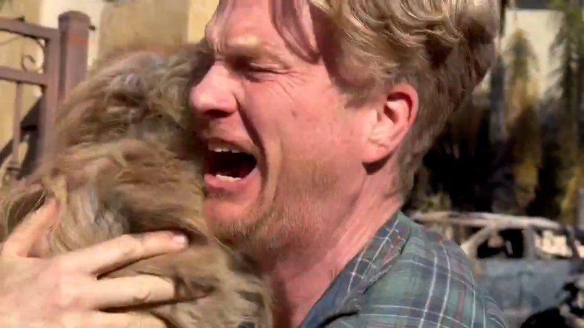 A tearful Casey Colvin rejoices after being reunited with his dog, Oreo, after he went missing during evacuation orders for the Palisades Fire.