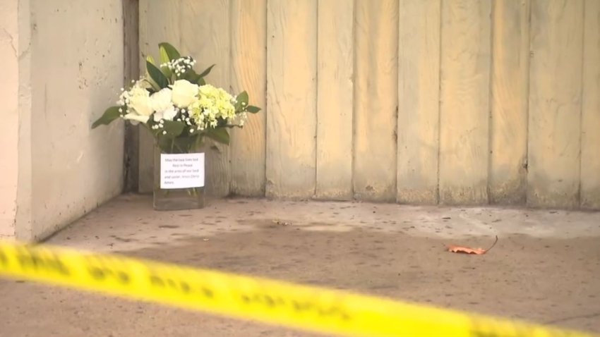 Flowers left at a memorial to honor two people killed in a Fullerton plane crash Jan. 2, 2025.