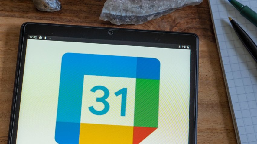 The Google Calendar logo is displayed on a tablet.