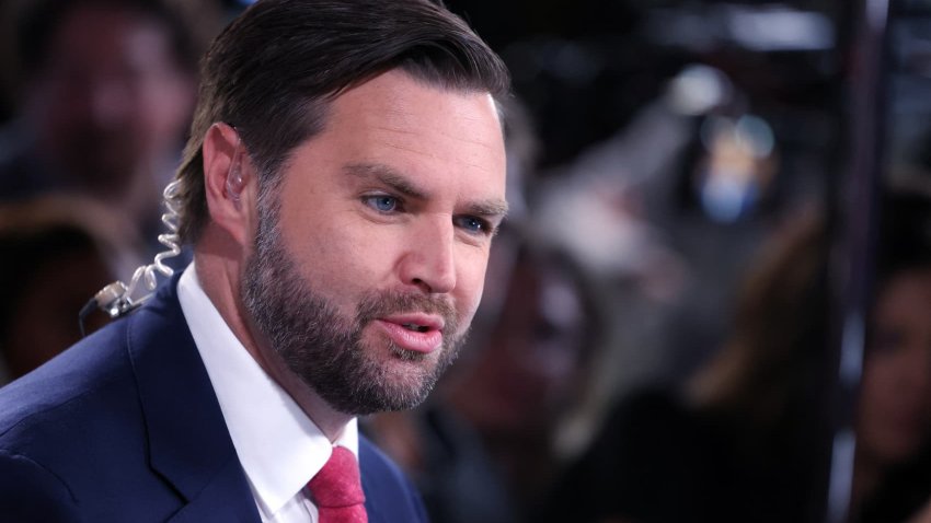 US Senator and Republican vice presidential candidate J.D. Vance speaks to a Fox News reporter in the spin room after participating in the Vice Presidential debate with Minnesota Governor and Democratic vice presidential candidate Tim Walz hosted by CBS News at the CBS Broadcast Center in New York on October 1, 2024. 