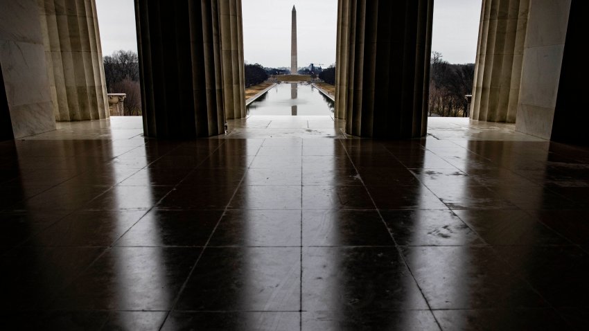 The Washington Monument is seen from inside the Lincoln Memorial