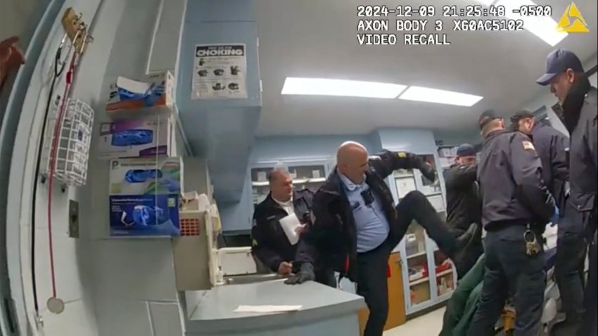 FILE – This image provided by the New York State Attorney General office shows body camera footage of correction officers beating a handcuffed man, Robert Brooks, 43, at the Marcy Correctional Facility in Oneida County, N.Y., on Dec. 9, 2024. (New York State Attorney General office via AP, File)