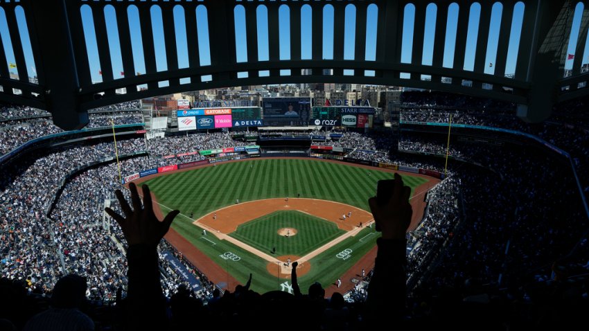 FILE - Fans react after New York Yankees' Aaron Judge hits a home run during the third inning of a baseball game against the San Francisco Giants at Yankee Stadium, April 2, 2023, in New York. (AP Photo/Seth Wenig, File)