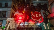 People celebrate following the Philadelphia Eagles Super Bowl win in Philadelphia, Pa., United States on February 9, 2025. The Philadelphia Eagles defeated the Kansas City Chiefs in the Super Bowl. (Photo by Thomas Hengge/Anadolu via Getty Images)