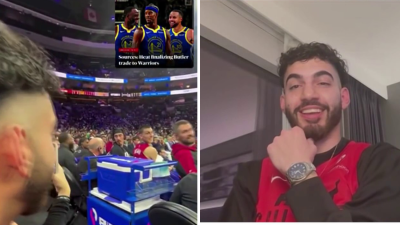 WATCH: Heat fan breaks news of Jimmy Butler trade to teammates during game