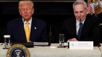 U.S. President Donald Trump sits next to Crypto czar David Sacks at the White House Crypto Summit at the White House in Washington, D.C., U.S.,  March 7, 2025.