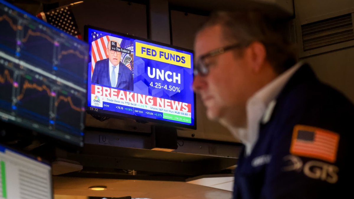 Dow closes nearly 400 points higher after Fed says two rate cuts are still in the cards for 2025: Live updates