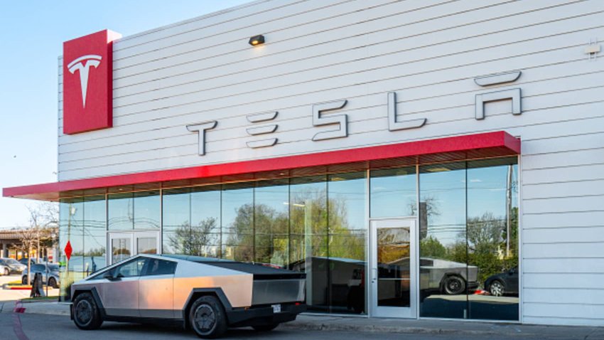 A Tesla Cybertruck is parked in front of a showroom on March 20, 2025 in Austin, Texas.