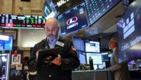 A trader works on the floor at the New York Stock Exchange on March 24, 2025.