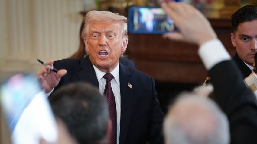 U.S. President Donald Trump greets members of the audience after signing a proclamation during a Greek Independence Day celebration at the White House on March 24, 2025 in Washington, DC. 