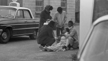 FILE - Amelia Boynton is aided by people after she was injured when state police broke up a demonstration march in Selma, Ala., March 7, 1965. Boynton, wife of a real estate and insurance man, has been a leader in civil rights efforts. (AP Photo, File)