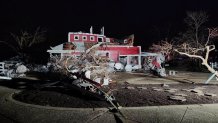 In this photo provided by Missouri State Highway Patrol, a home is damaged after a severe storm passed the area near Ozark County, Mo., late Friday, March 14, 2025. (Missouri State Highway Patrol via AP)