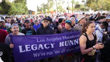 Members of the Legacy Runners gather at the start of the Los Angeles Marathon Sunday, March 16, 2025, in Los Angeles.