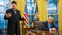 Elon Musk speaks as US President Donald Trump looks on in the Oval Office of the White House in Washington, DC, on February 11, 2025. Tech billionaire Elon Musk, who has been tapped by President Donald Trump to lead federal cost-cutting efforts, said the United States would go 