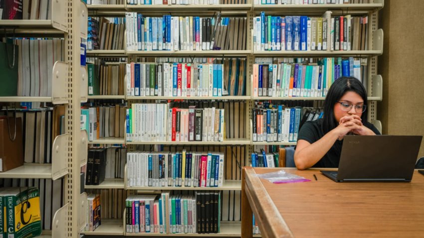 Rhetoric & Writing Studies Major, Adamary Garcia studies inside of the Perry-Castaneda Library at the University of Texas at Austin on February 22, 2024 in Austin, Texas.