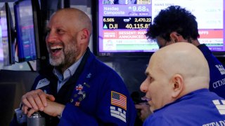 Traders work on the floor at the New York Stock Exchange on April 9, 2025.
