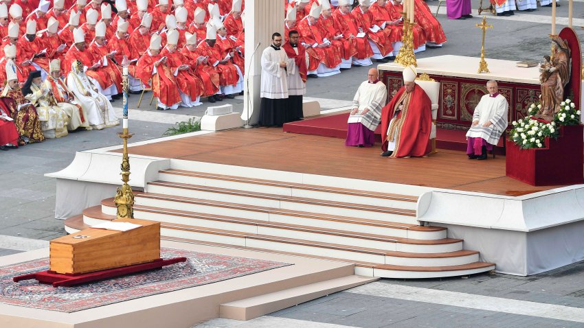 Pope Francis (R) presides over the funeral mass of Pope Emeritus Benedict XVI