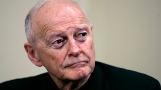 FILE - Former Washington Archbishop Theodore McCarrick listens during a news conference in Washington, May 16, 2006. A Wisconsin judge on Wednesday, Jan. 10, 2024, ruled that the former Catholic cardinal is not competent to stand trial, due to a diagnosis of dementia, suspending charges of sexually assaulting a boy in the 1970s.