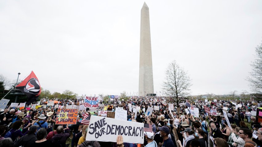 Tens of thousands gather for anti-Trump protests