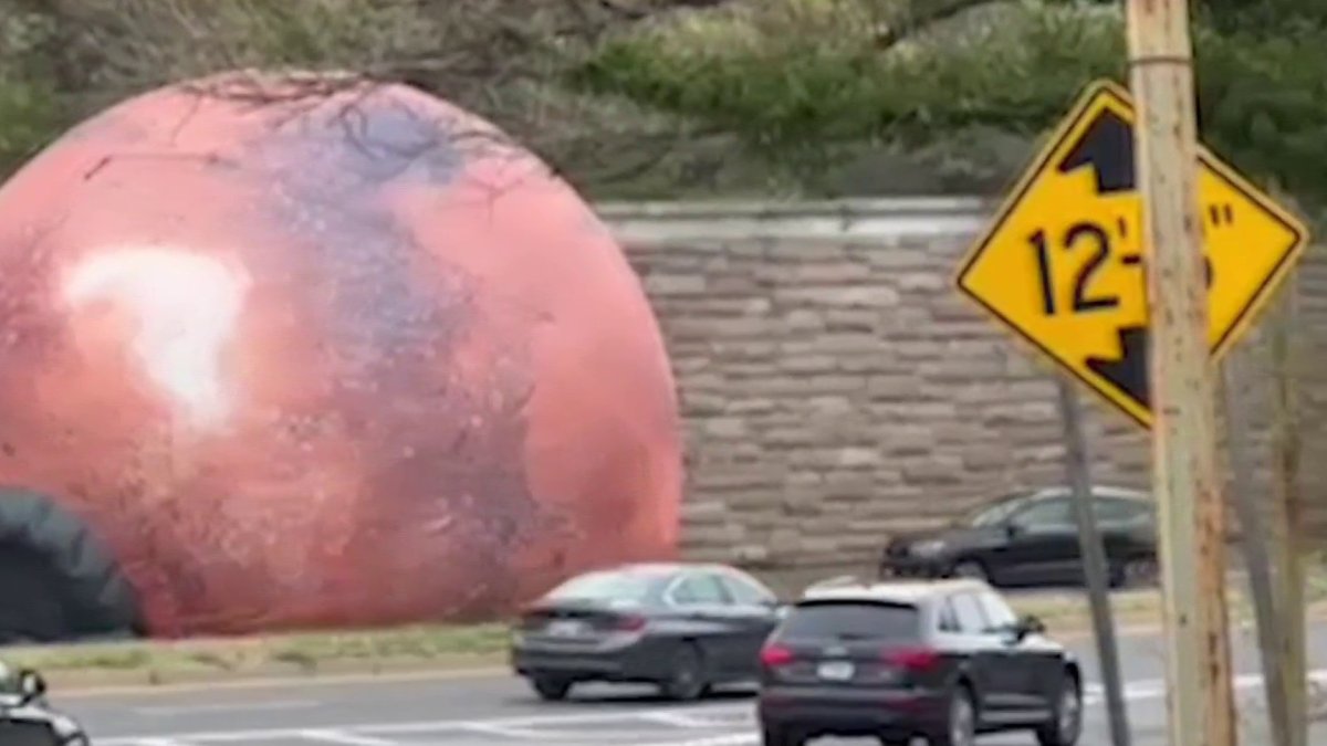 Giant Mars balloon escapes Kennedy Center plaza, rolls toward highway