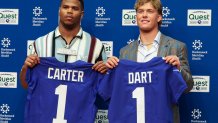Apr 25, 2025; East Rutherford, NJ, US; New York Giants first round draft picks, Abdul Carter and Jaxson Dart pose for photos prior to the start of the press conference. Mandatory Credit: Thomas Salus-Imagn Images