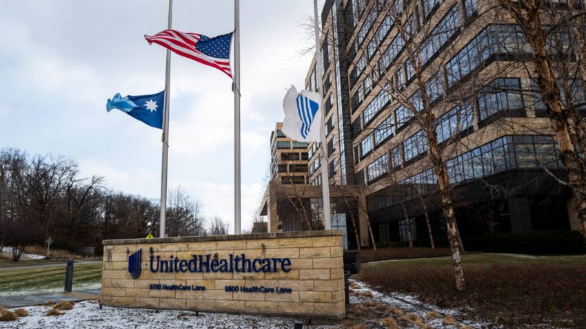 Flags fly at half staff outside the United Healthcare corporate headquarters in Minnetonka, Minnesota, Dec. 4, 2024.