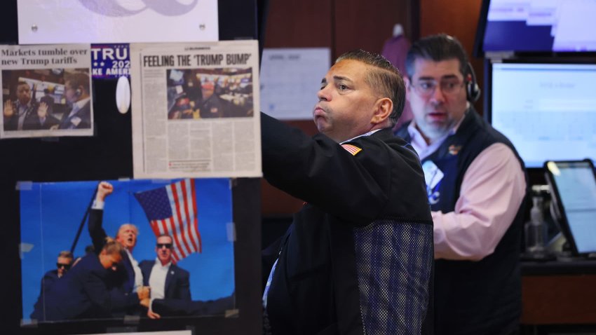 Traders work on the floor of the New York Stock Exchange during morning trading on April 30, 2025 in New York City.