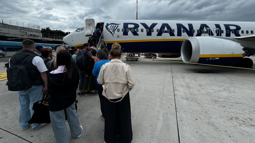 People board Ryanair plane at Rome Ciampino Airport in Ciampino, Italy on April 27, 2025.