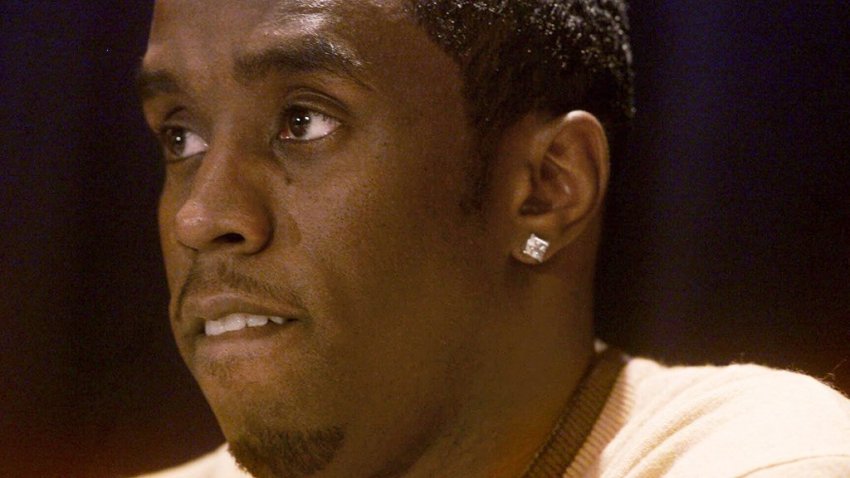 FILE - Rapper-producer Sean "Puffy" Combs answers questions at a news conference on Dec. 28, 1999, in New York, a day after he was arrested and charged with weapons possession after police allegedly found a stolen pistol in his car as he and actress-singer Jennifer Lopez left a nightclub where three people were shot and wounded. (AP Photo/Suzanne Plunkett, File)