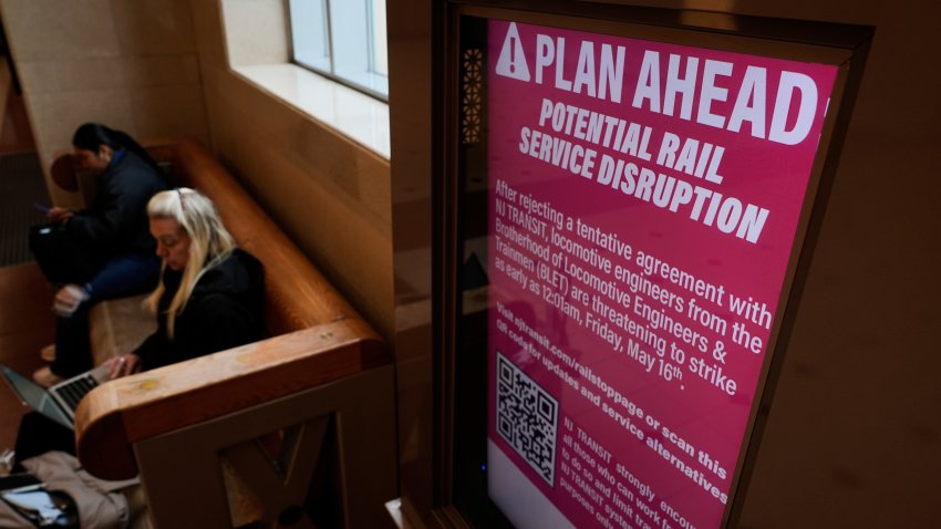 An electronic display advises commuters of potential NJ Transit service disruptions at the Secaucus Junction station in Secaucus, N.J., Wednesday, May 14, 2025.