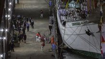 Sailow on the Cuauhtémoc, a Mexican training ship of the Mexican Navy, determined at the Pier 35 after the ship had come together in New York with the Brooklyn Bridge on Saturday, May 17, 2025. (AP Photo/Yuki Iwamura)