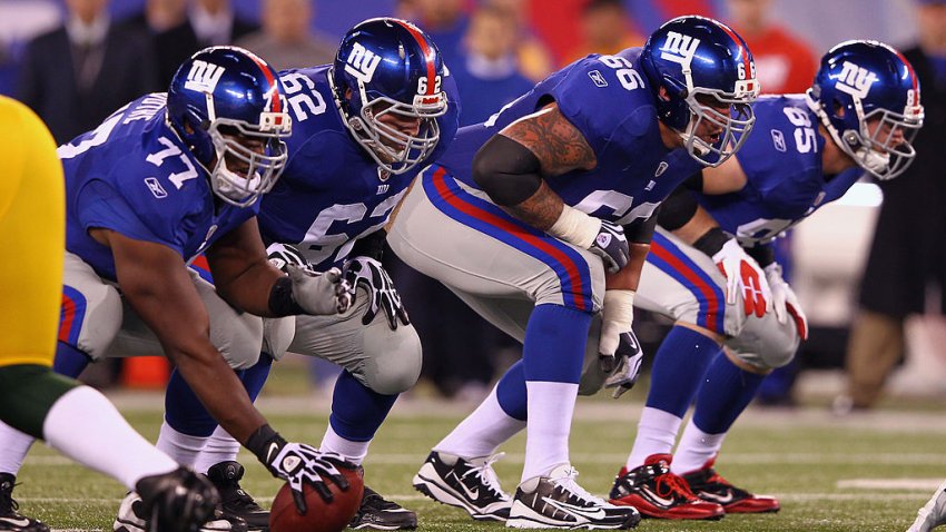 EAST RUTHERFORD, NJ – DECEMBER 04:  Offensive linemen center Kevin Boothe #77, guard Mitch Petrus #62, tackle David Diehl #66 and tight end Jake Ballard #85 of the New York Giants line up in their stance against the Green Bay Packers at MetLife Stadium on December 4, 2011 in East Rutherford, New Jersey.  (Photo by Al Bello/Getty Images)