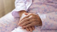 In this stock image, an elderly woman's hands are shown.