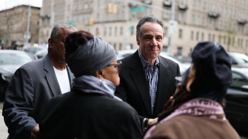 New York City mayoral candidate Andrew Cuomo, talks to people on the street as he arrives to attend a Sunday service at First Corinthian Baptist Church in the Harlem neighborhood of New York City on April 13, 2025. Andrew Cuomo, the former Democratic governor of New York and a man once thought to have his eye on the presidency, will run in November to be mayor of New York City. The current mayor of the largest US city, Eric Adams, is embattled — politically wounded by indictment on corruption charges. Cuomo himself resigned amid scandal in 2021 after 10 years as governor following accusations of sexual harassment. A prosecutor dropped charges against him in January 2022.
