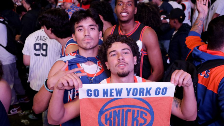 New York Knicks fans celebrate after their team won game 6 of the NBA playoffs against the reigning champions Boston Celtics outside Madison Square Garden in New York on May 16, 2025. (Photo by Leonardo Munoz / AFP) (Photo by LEONARDO MUNOZ/AFP via Getty Images)