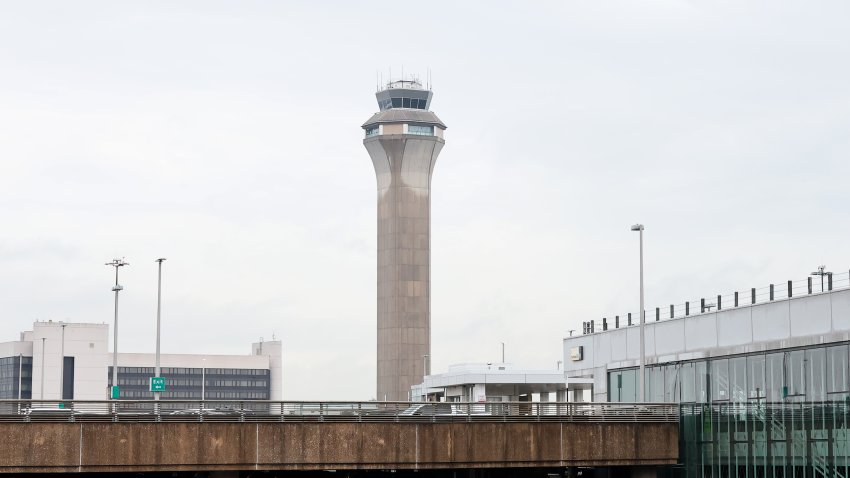 NEWARK, NEW JERSEY – MAY 14: A traffic tower is seen at Newark Liberty International Airport on May 14, 2025 in Newark, New Jersey. A shortage of air traffic controllers continues to delay flights in and out of the airport. On Monday, flights to Newark were delayed by up to seven hours the same day the Trump administration announced the formation of an emergency task force made up of executives from Verizon, L3Harris, and the Federal Aviation Administration to address communications issues at the airport.