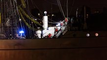 Emergency personnel respond after the Mexican Navy's tall ship Cuauhtemoc collided with the Brooklyn Bridge in New York City on May 17, 2025. The ship, which had been docked as part of a goodwill tour, struck the underside of the bridge while departing, injuring dozens. Rescue operations were launched as crew members evacuated and emergency boats arrived on scene. (Photo by Madison Swart / Hans Lucas / Hans Lucas via AFP) (Photo by MADISON SWART/Hans Lucas/AFP via Getty Images)