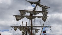 NEW YORK, NEW YORK - MAY 18: The damaged masts of the Cuauhtémoc, a Mexican Navy training ship that crashed into the Brooklyn Bridge, are seen as it sits docked at Pier 36 in lower Manhattan on May 18, 2025 in New York City. The ship, which snapped all three of its masts as it collided with the New York City landmark bridge, killed at least two people and injured dozens of others.  (Photo by Spencer Platt/Getty Images)