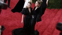 NEW YORK, NY - MAY 04:  Mary Kate Olsen and Ashley Olsen attend the "China: Through The Looking Glass" Costume Institute Benefit Gala at the  Metropolitan Museum of Art on May 4, 2015 in New York City.  (Photo by Neilson Barnard/Getty Images)