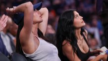 May 12, 2025; New York, New York, USA; American socialites Kendall Jenner, left, and Kylie Jenner look on while seated courtside in the second half during game four of the second round for the 2025 NBA Playoffs at Madison Square Garden. Mandatory Credit: Vincent Carchietta-Imagn Images