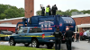 1 live man, 1 body pulled from garbage truck after Long Island school stop 