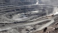 Miners are seen at the Bayan Obo mine containing rare earth minerals, in Inner Mongolia, China July 16, 2011.