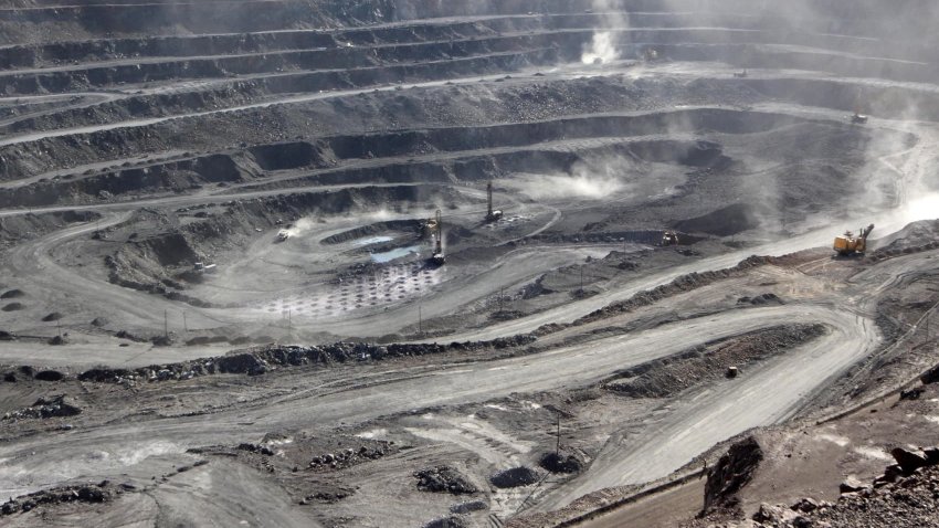Miners are seen at the Bayan Obo mine containing rare earth minerals, in Inner Mongolia, China July 16, 2011.