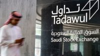 This picture taken December 12, 2019 shows a view of the sign showing the logo of Saudi Arabia’s Stock Exchange Market (Tadawul) bourse in the capital Riyadh.