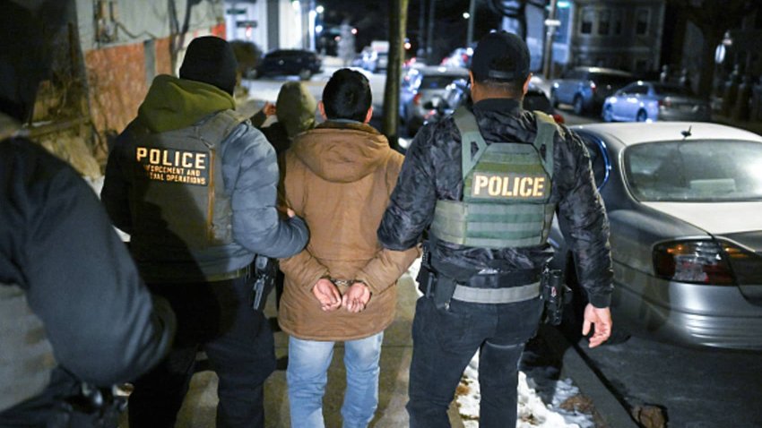 Law enforcement walk with Leonardo Fabian Cando Juntamay as he was detained in the Bronx during ICE led operations to apprehend illegal immigrants on Tuesday January 28, 2025 in New York, NY. 