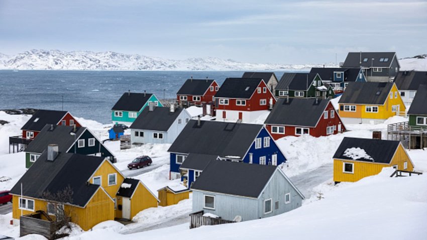 A general view of a residential area of Nuuk, Greenland, on March 10, 2025, on the eve of a parliamentary election  in Greenland, the autonomous Danish territory. Two days of storm and mild weather has ripped political posters of posts and melted snow in Greenland’s capital. 