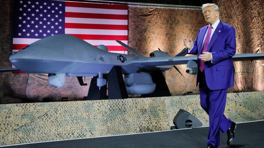 U.S. President Donald Trump gestures while delivering remarks to U.S. troops during a visit to Al Udeid Air Base in Doha, Qatar, May 15, 2025.
