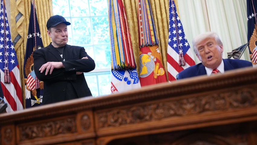 Tesla CEO Elon Musk listens as U.S. President Donald Trump speaks to reporters in the Oval Office of the White House on May 30, 2025 in Washington, DC.