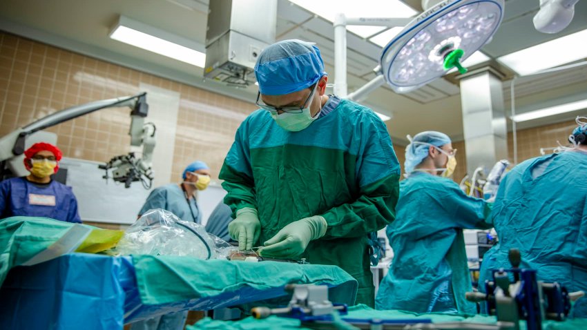 Dr. Matthew Willsey working in the operating room.